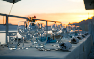 Restaurant glassware with sunset background.